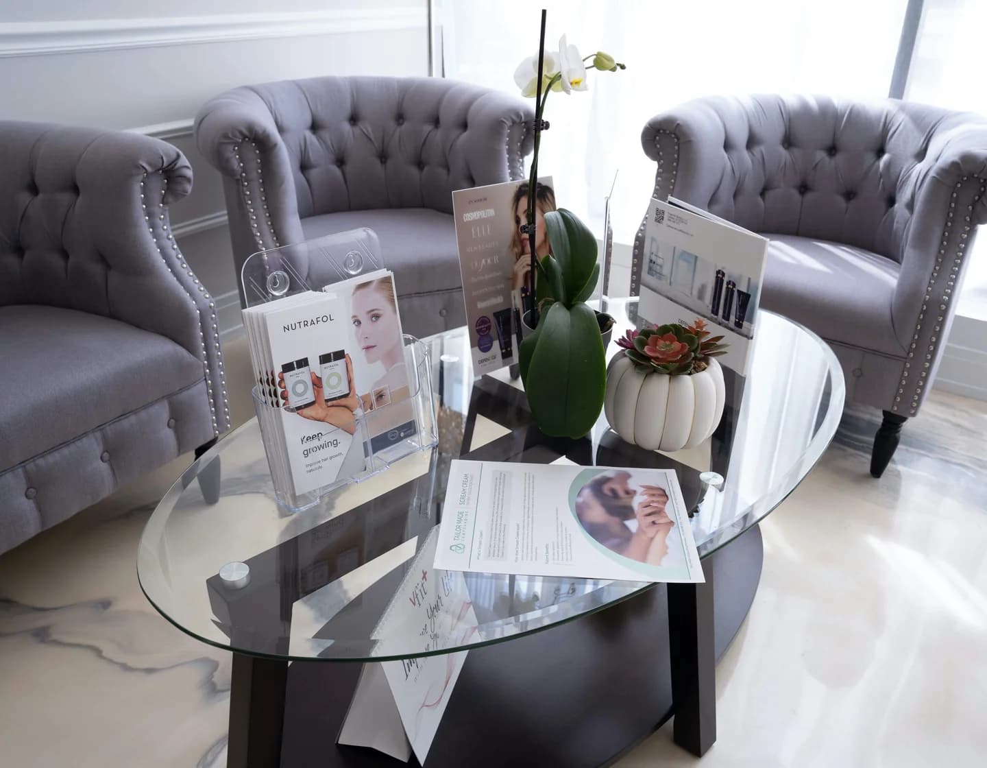 The consultation lounge at Skin Med Spa, with treatment and pricing information on the table